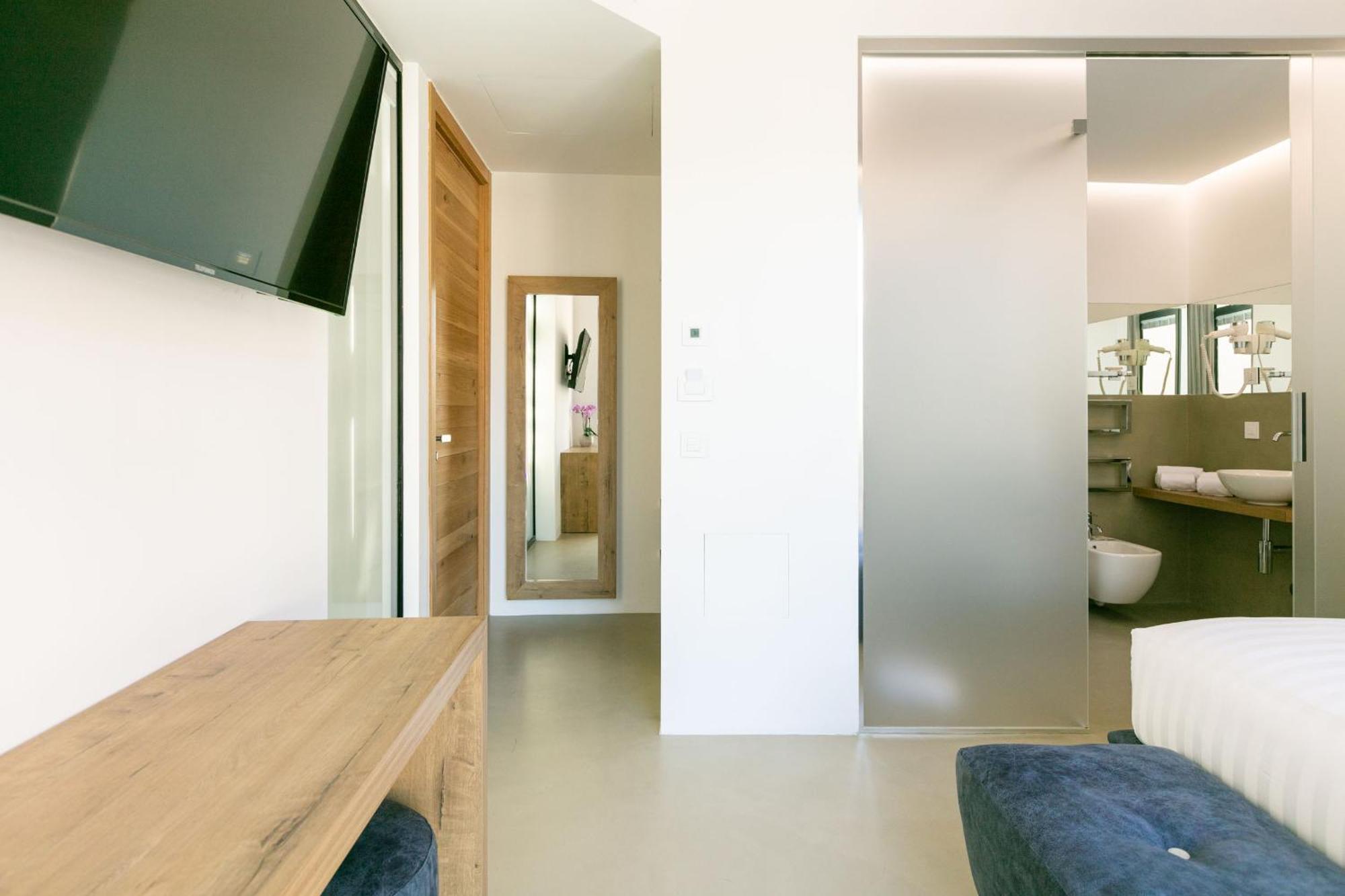 Domus Cavour Rooms&Suites ティラーノ 部屋 写真