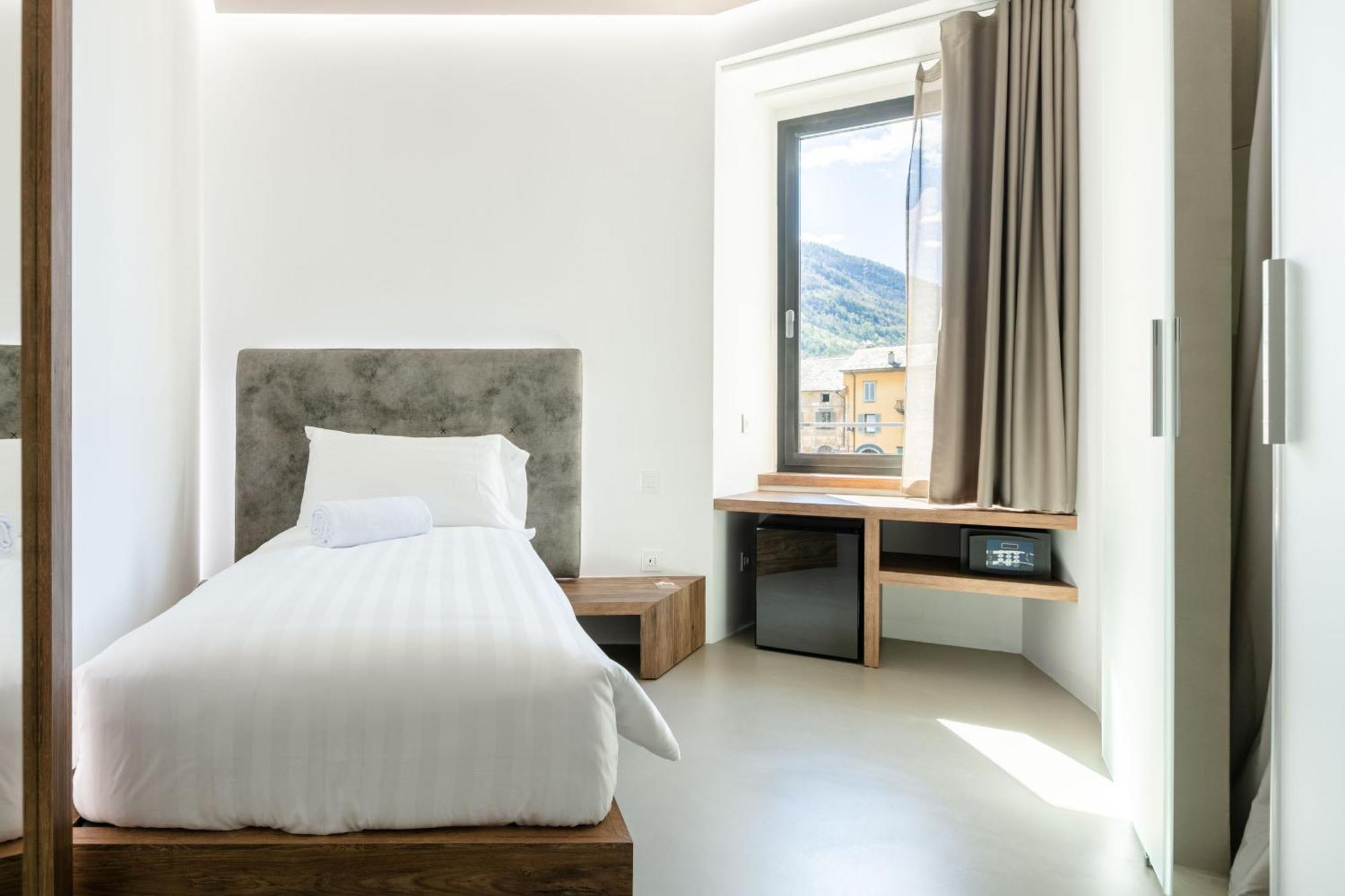 Domus Cavour Rooms&Suites ティラーノ 部屋 写真